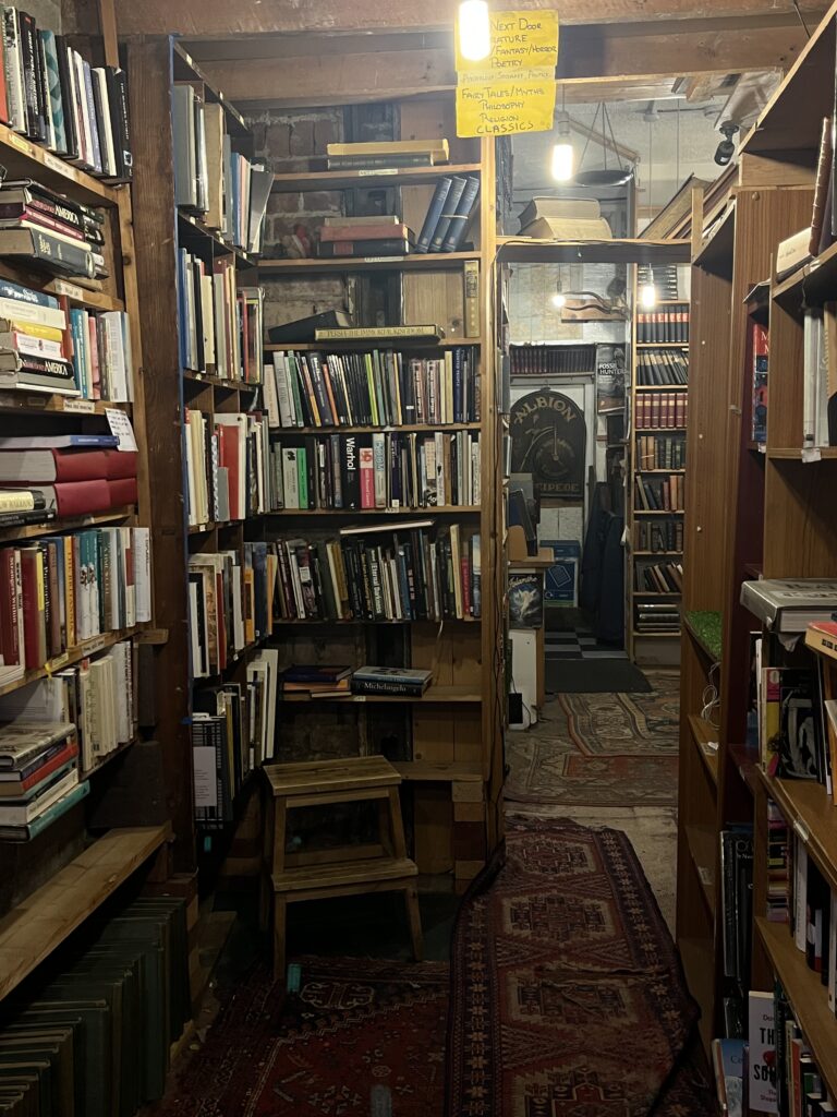 Old bookstore with wooden bookshelves in Edinburgh